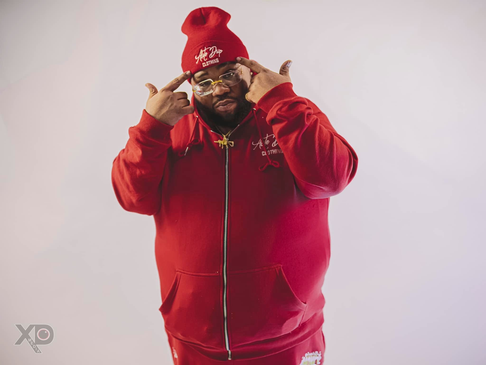 Portrait in red branded clothing